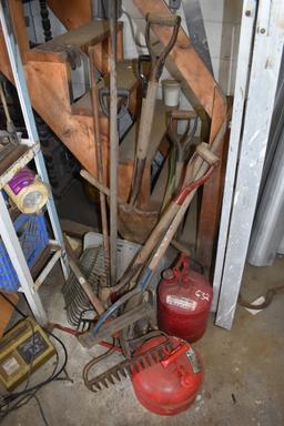 Group of Yard Tools and Gas Cans
