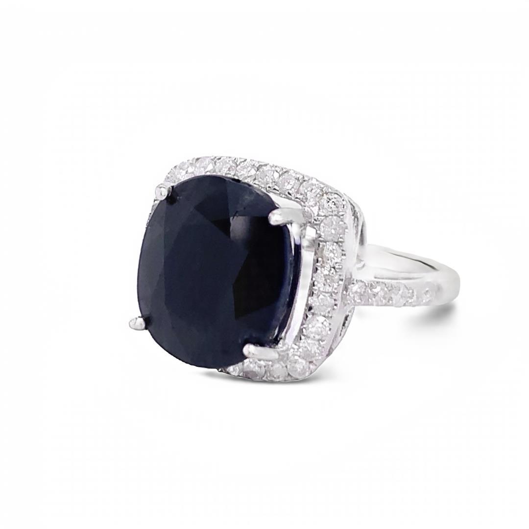 10.26 ctw Dark Blue Sapphire and 0.72 ctw Diamond 14K White Gold Ring