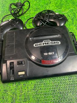 sega Genesis 16 bit with controllers and games