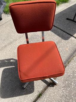 vintage orange cushion griggs metal rolling chair