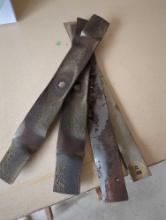 Two sets of lawnmower blades