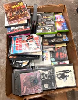 Box Full of DVDs and CDs