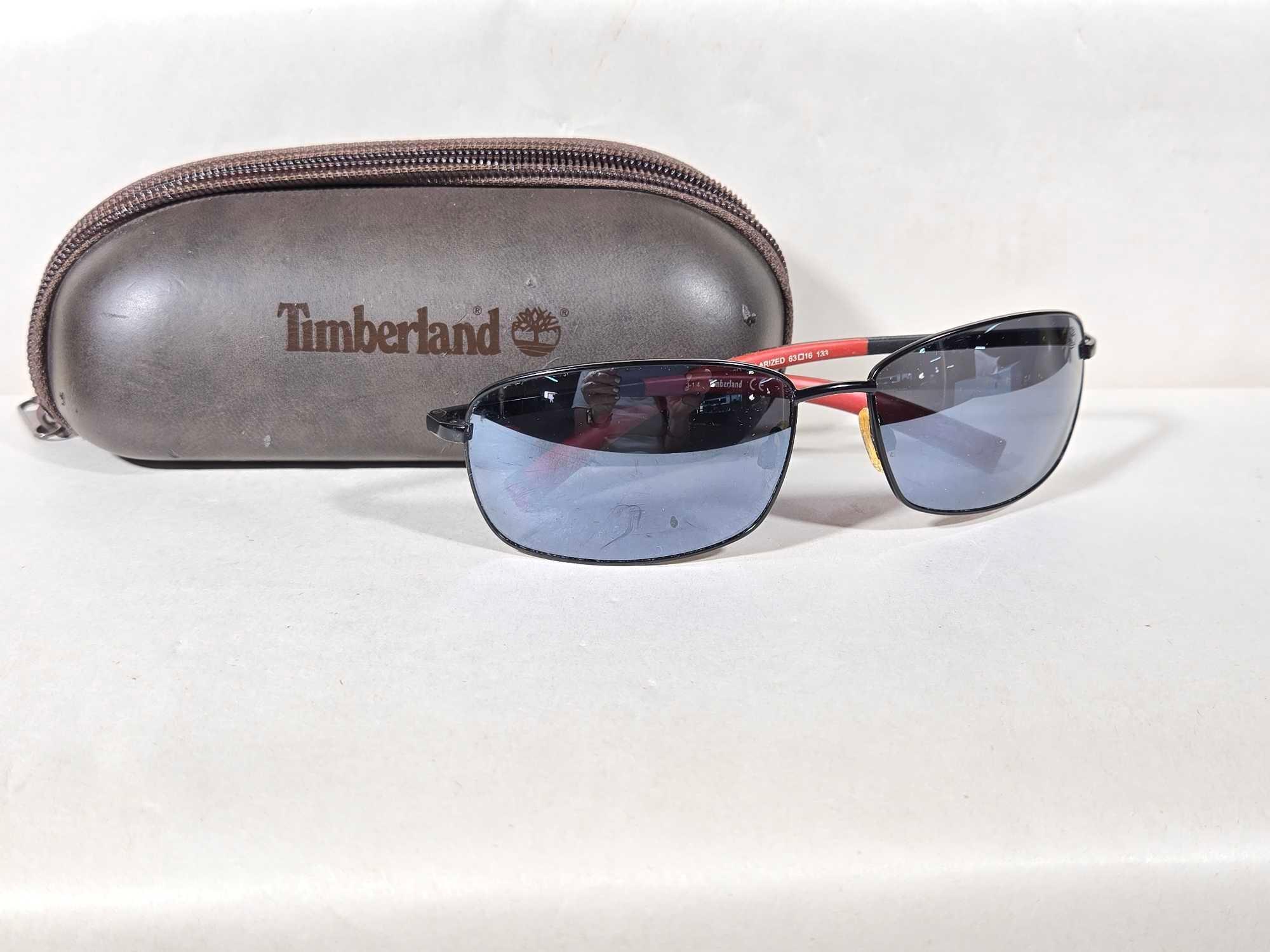 4 Pair of Pre-Owned Men's Sunglasses Incl. Oakley, Armani, & Timberland
