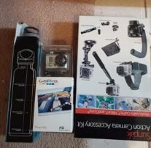 Lot of thermo in box, TrueHD GoPro camera in box and Sunpak action camera accessory kit to GoPro