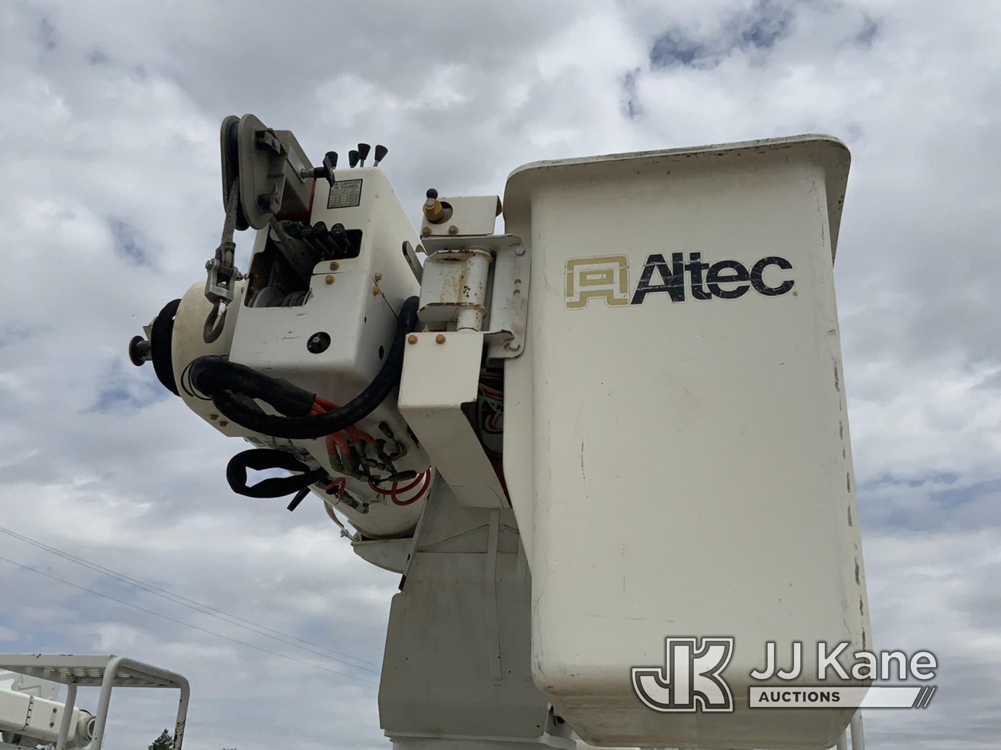 (Dighton, KS) Altec AM855-MH, Over-Center Material Handling Bucket Truck rear mounted on 2000 Freigh