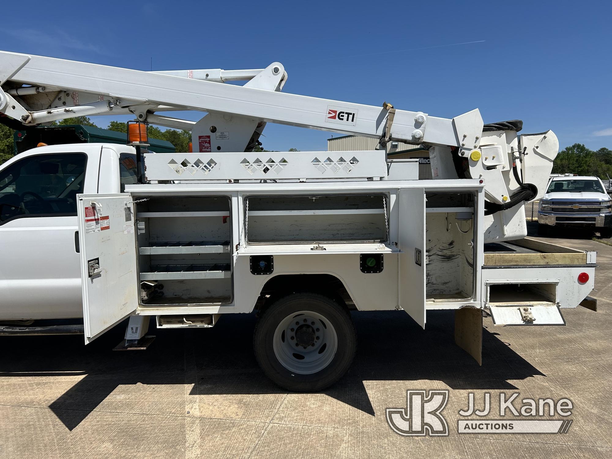 (Conway, AR) ETI ETC37IH, Articulating & Telescopic Bucket Truck mounted behind cab on 2014 Ford F55