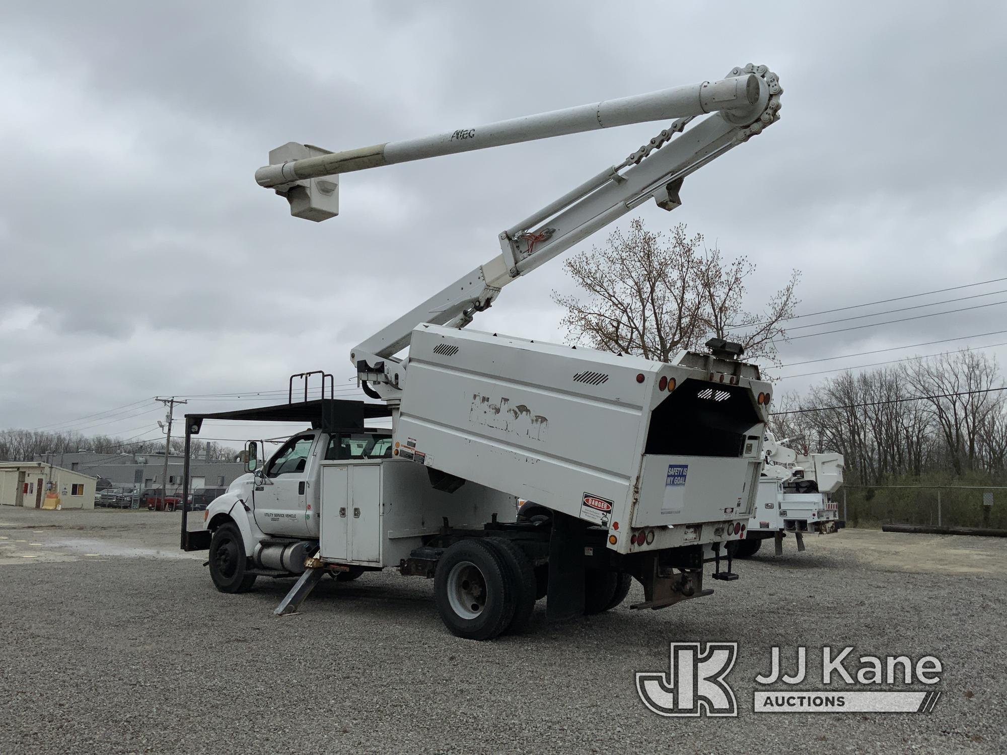 (Fort Wayne, IN) Altec LR756, Over-Center Bucket Truck mounted behind cab on 2015 Ford F750 Chipper