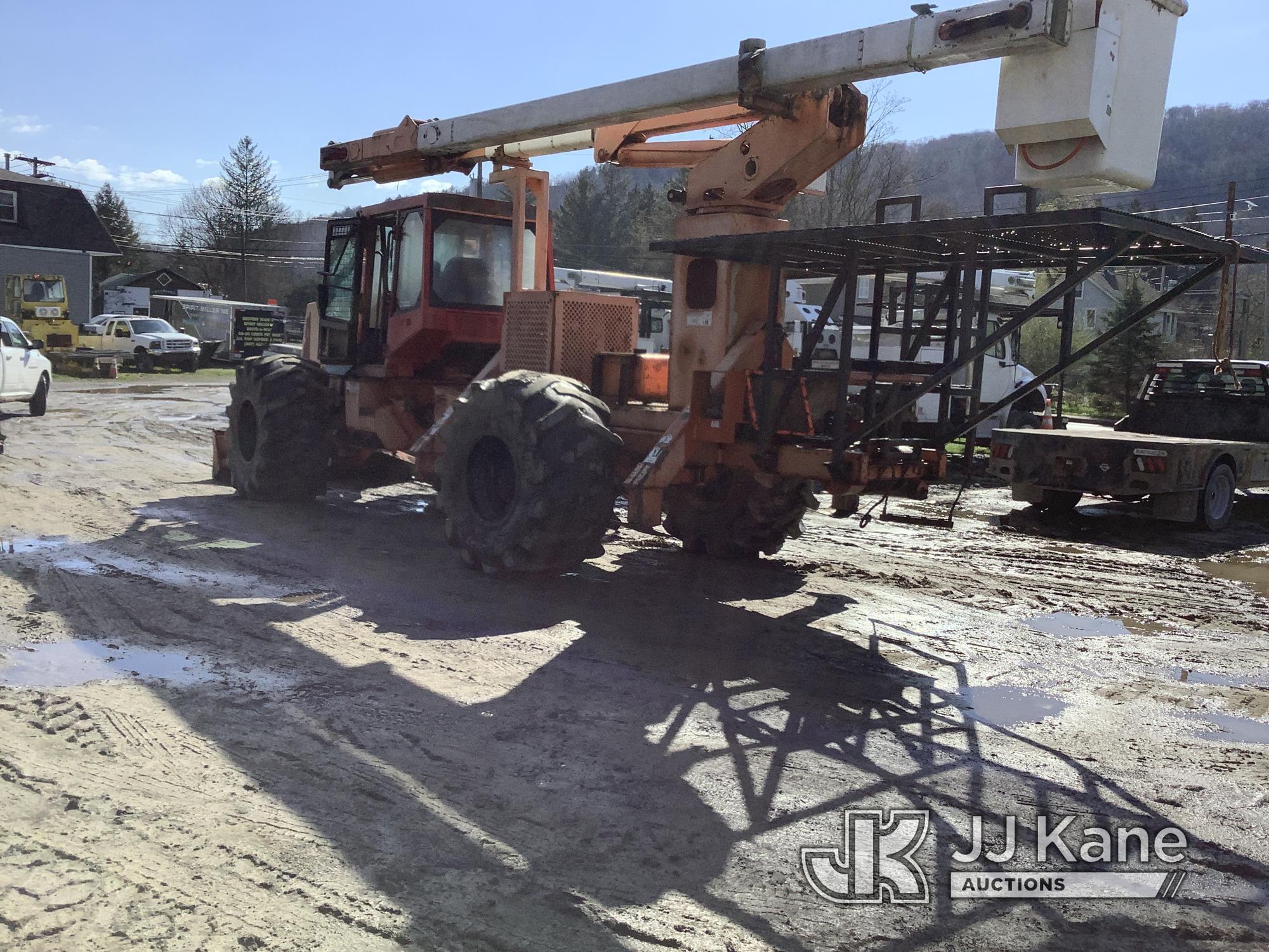 (Deposit, NY) Terex XT55, Over-Center Bucket Truck rear mounted on 1996 Timberjack 460 Rubber Tired