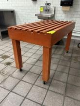 Wooden Merchandising Table On Casters