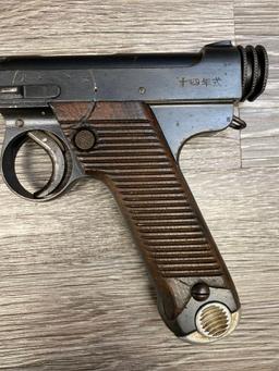 WWII JAPANESE TYPE 14 SEMI-AUTO PISTOL W/ CLAMSHELL HOLSTER