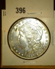1887 P Morgan Silver Dollar, Uncirculated.