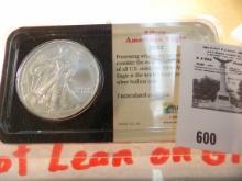 2002 Silver American Eagle in a Littleton Coin Co. Holder, Brilliant Uncirculated.