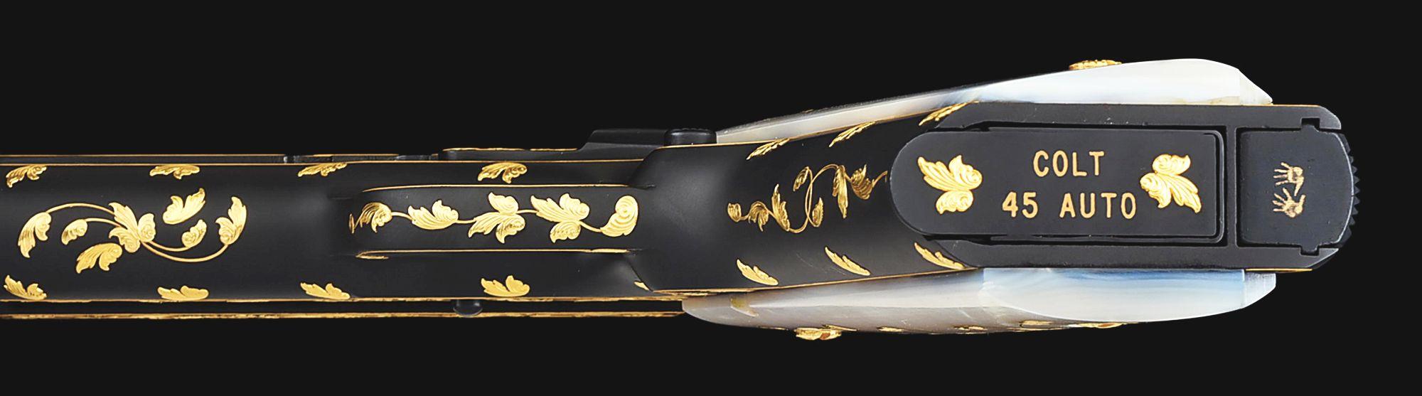 (C) BARRY LEE HANDS MASTER ENGRAVED AND GOLD INLAID COLT 1911A1 SEMI AUTOMATIC PISTOL.