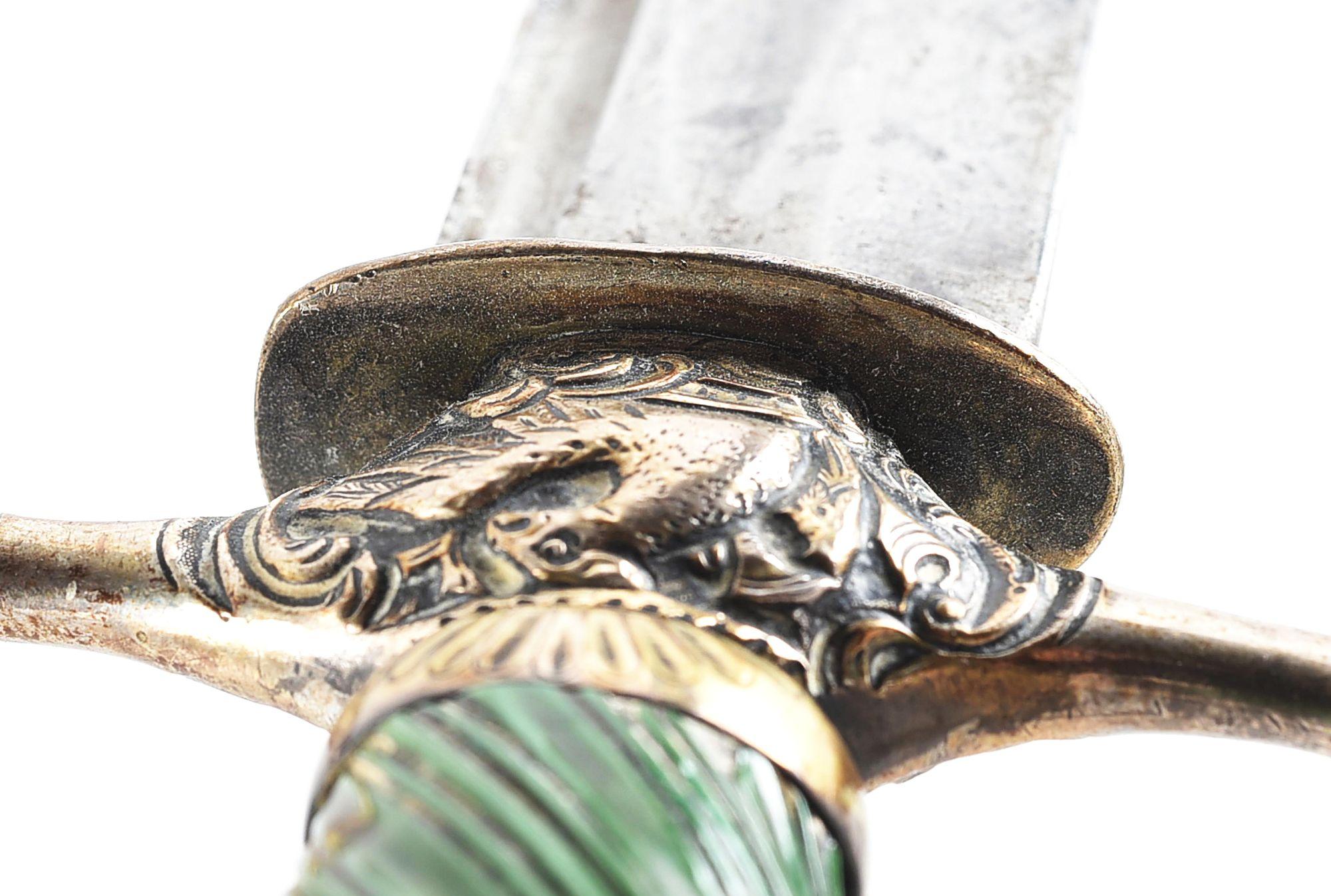 SILVER HILTED EAGLE HEAD POMMEL SWORD WITH SCABBARD.