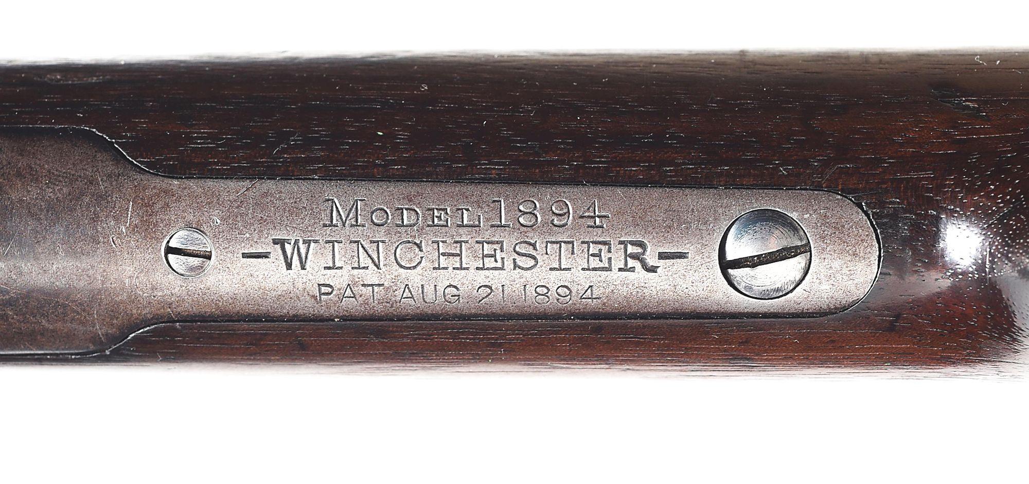 (C) WINCHESTER MODEL 1894 SADDLE RING CARBINE IN .38-55.