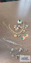 Safari necklace and other costume jewelry, keychains and pins and broken rhinestone jewelry
