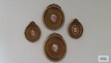 Four decorative French Provincial style wall hangings with ceramic centerpieces