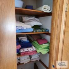 Lot of bath towels and etc in closet