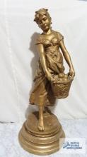Girl with basket of apples metal bronze colored sculpture. Approximately 31-1/2 in. tall.