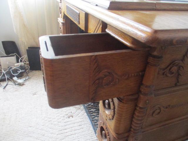 Antique Singer Treadle Sewing Machine in Tiger Oak Cabinet