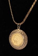 Gold $5.00 Indian Head Coin dated 1913, very good condition, mounted in a 14 KT gold Bezel with 18"