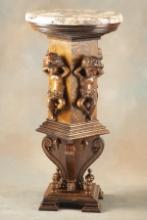 Museum quality antique oak Pedestal, circa 1900s, with 4 fully carved cherubs on column and unique c