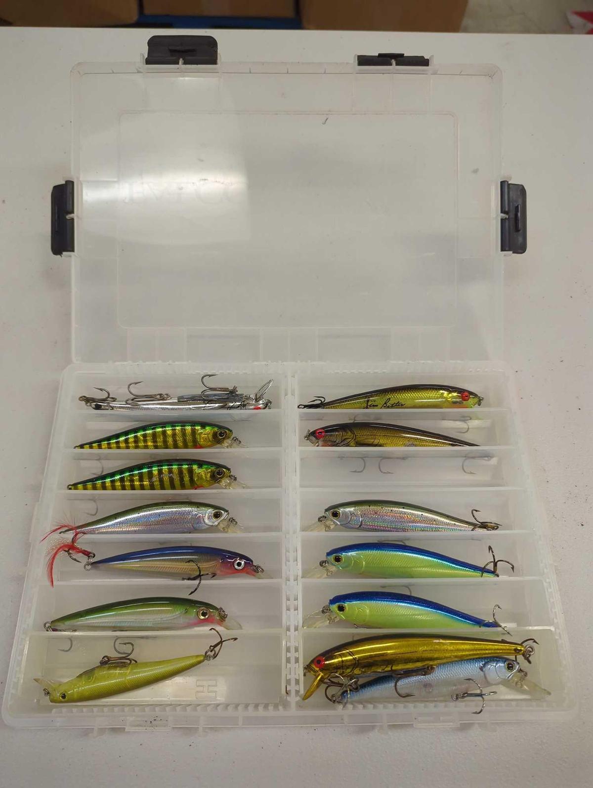 Tackle Box and contents including various fishing lures of similar style. Comes as is shown in