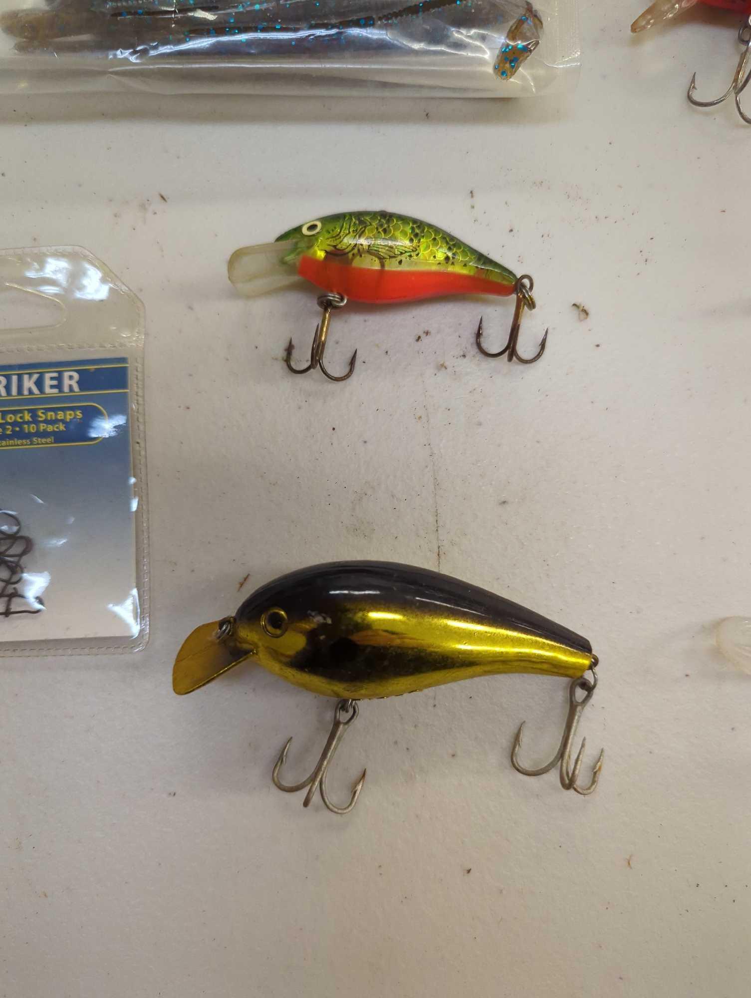 Tackle Box and contents including worms and other various fishing lures. Comes as is shown in
