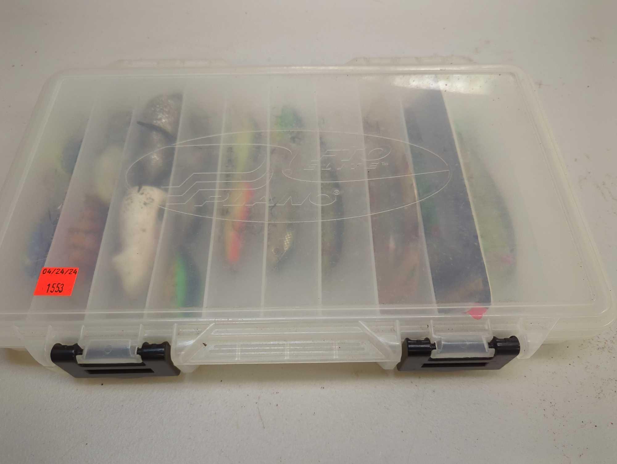 Tackle Box and contents including various fishing lures of similar style. Comes as is shown in