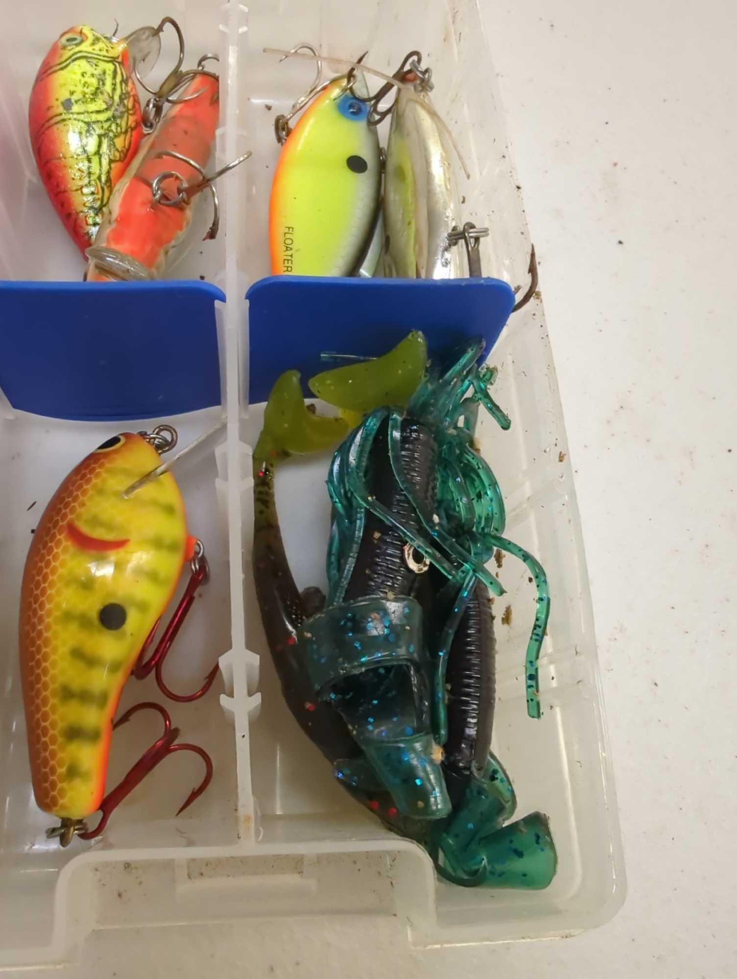 Tackle Box and contents including worms and various fishing lures of similar style. Comes as is