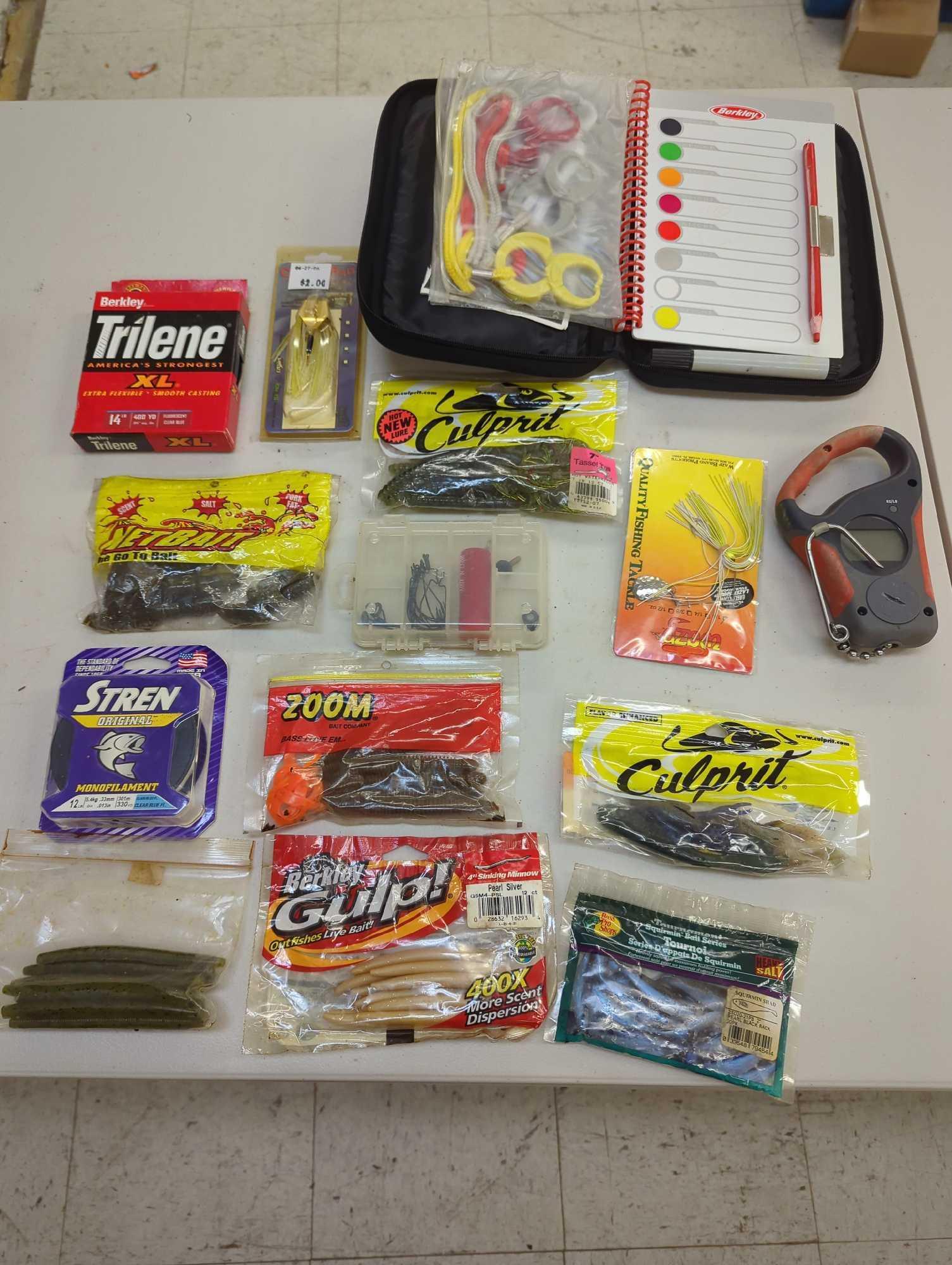 Refrigerator drawer filled with fishing lures and other fishing accessories. Comes as is shown in