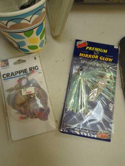 Large tin and contents including various fishing lures and fishing accessories. Comes as is shown in