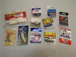 Box and contents including fishing lures and other fishing accessories. Comes as is shown in photos.