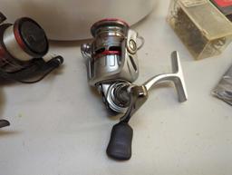 Bucket of fishing gear including glasses, fishing line, reels, and lures. Comes as is shown in