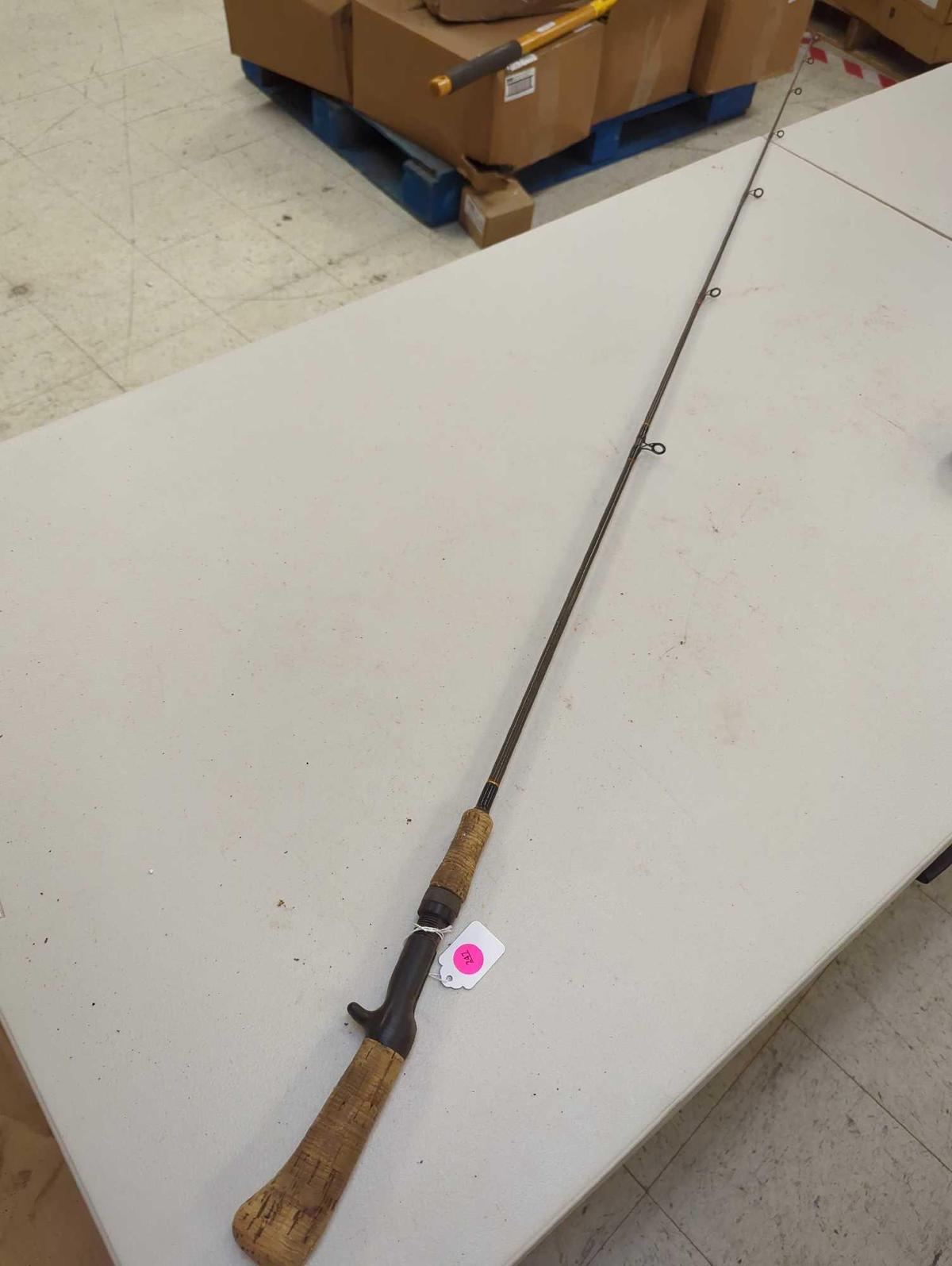 Black 5'6" fishing rod. Comes as is shown in photos. Appears to be used.