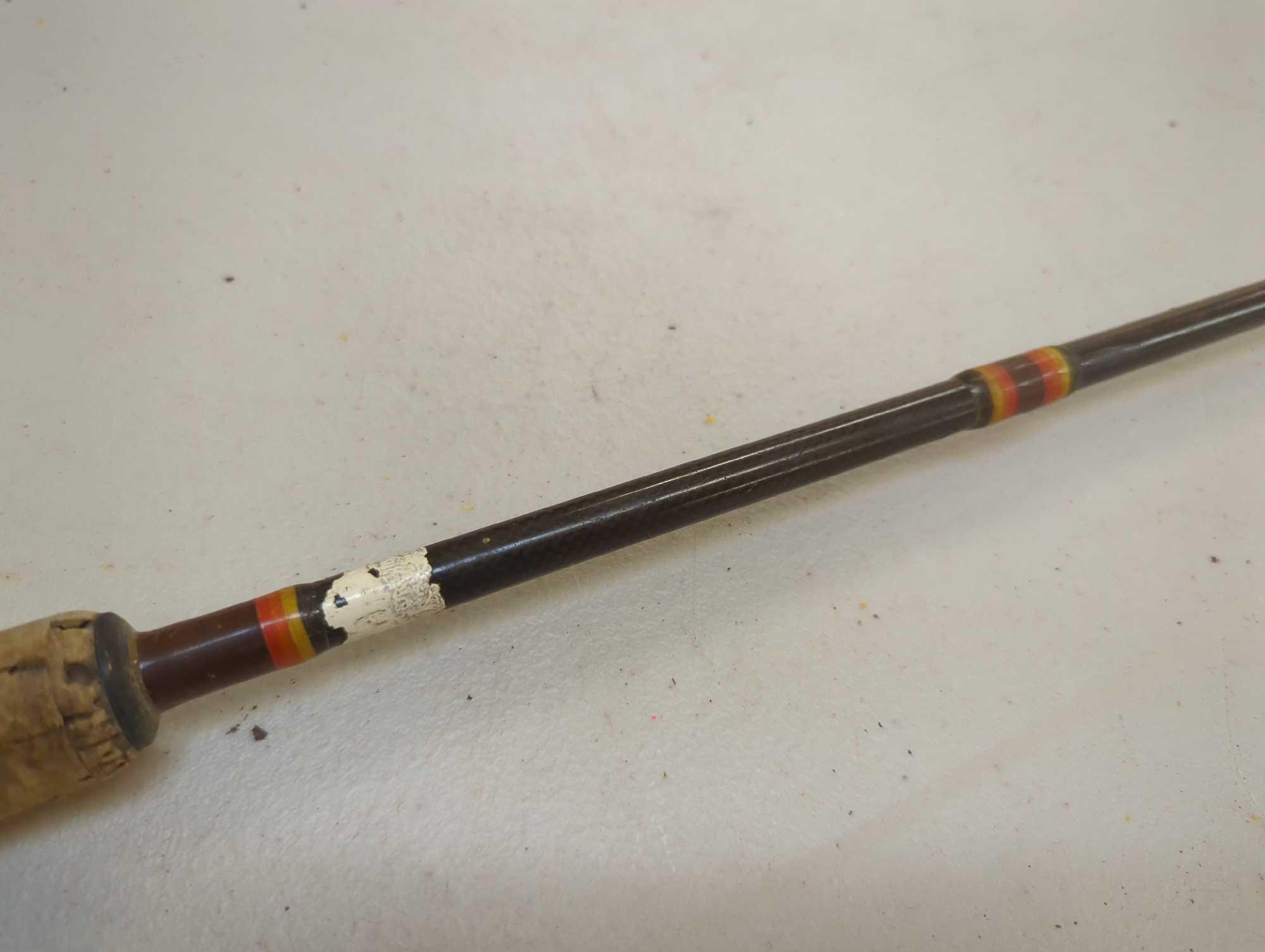Brown 5'8" fishing rod with spinning reel. Comes as a shown in photos. Appears to be used.