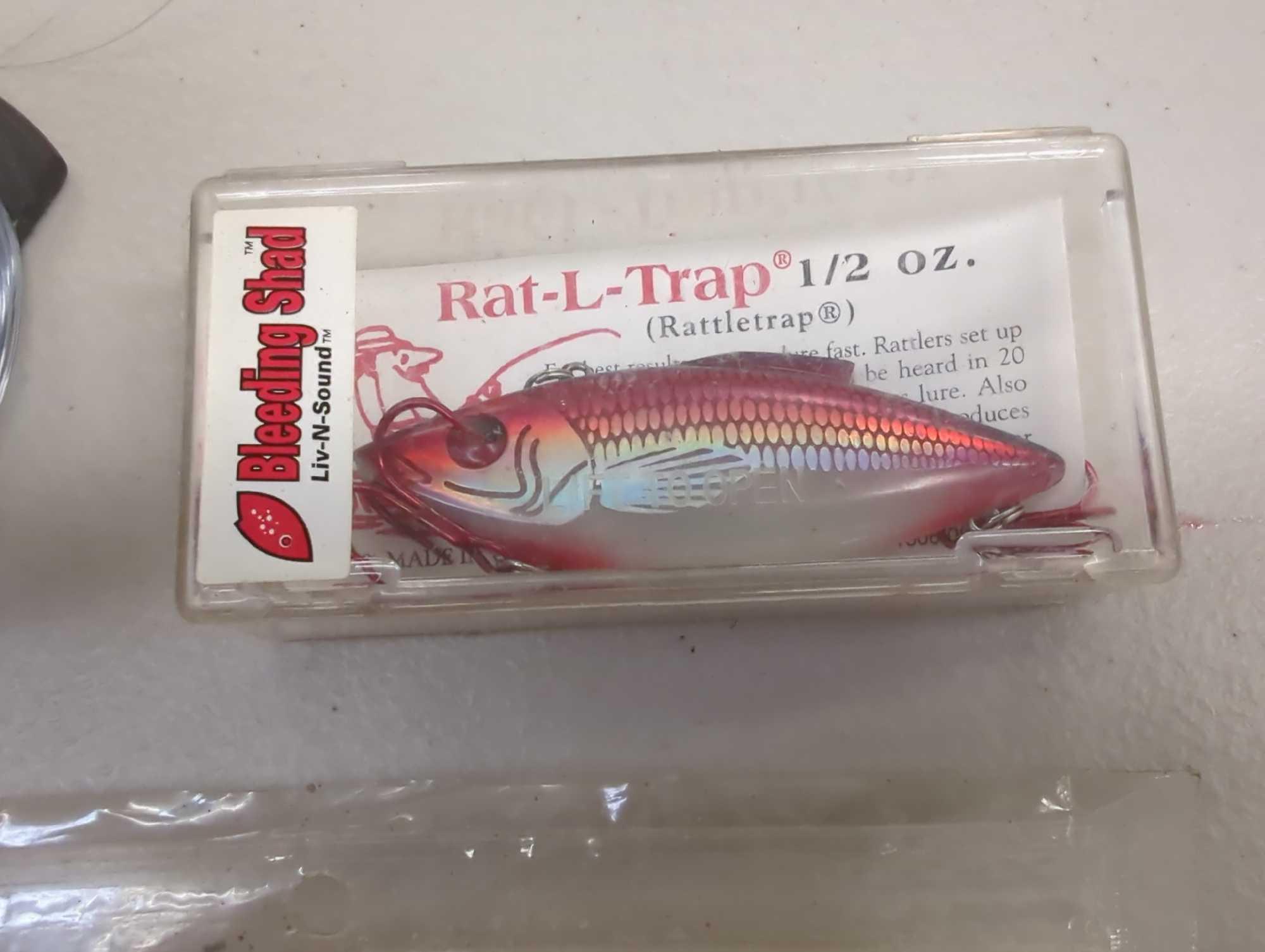 Box of fishing lures and other various fishing accessories. Comes as is shown in photos. Appears to