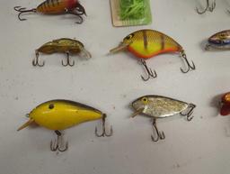 Tackle Box and contents including various fishing lures of similar style. Comes as is shown in