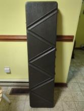 (BR2) BLACK HARDSHELL RIFLE CASE. MISSING CARRYING HANDLES. MEASURES APPROX. 52" X 4.5" X 13".