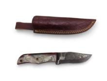 Handmade Damascus steel knives with custom wood, bone, horn or resin handles. The knives are made