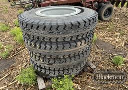 (4) 9.00/20 TIRES ON DAYTONS,