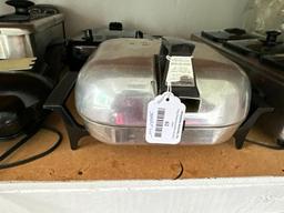 Shelf Lot of Counter Top Kitchen Appliances and Plastic Ware