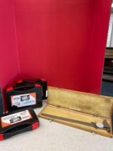 Three copper grounding bus bar kits and a vintage caliper in wood box