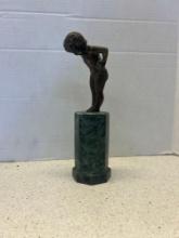 bronze boy figure on marble base