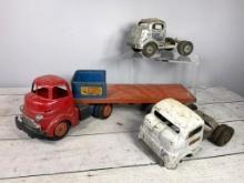Group of Toy Trucks Including Wyandotte Construction Company Semi Trailer and 2 Structo Semi Cabs