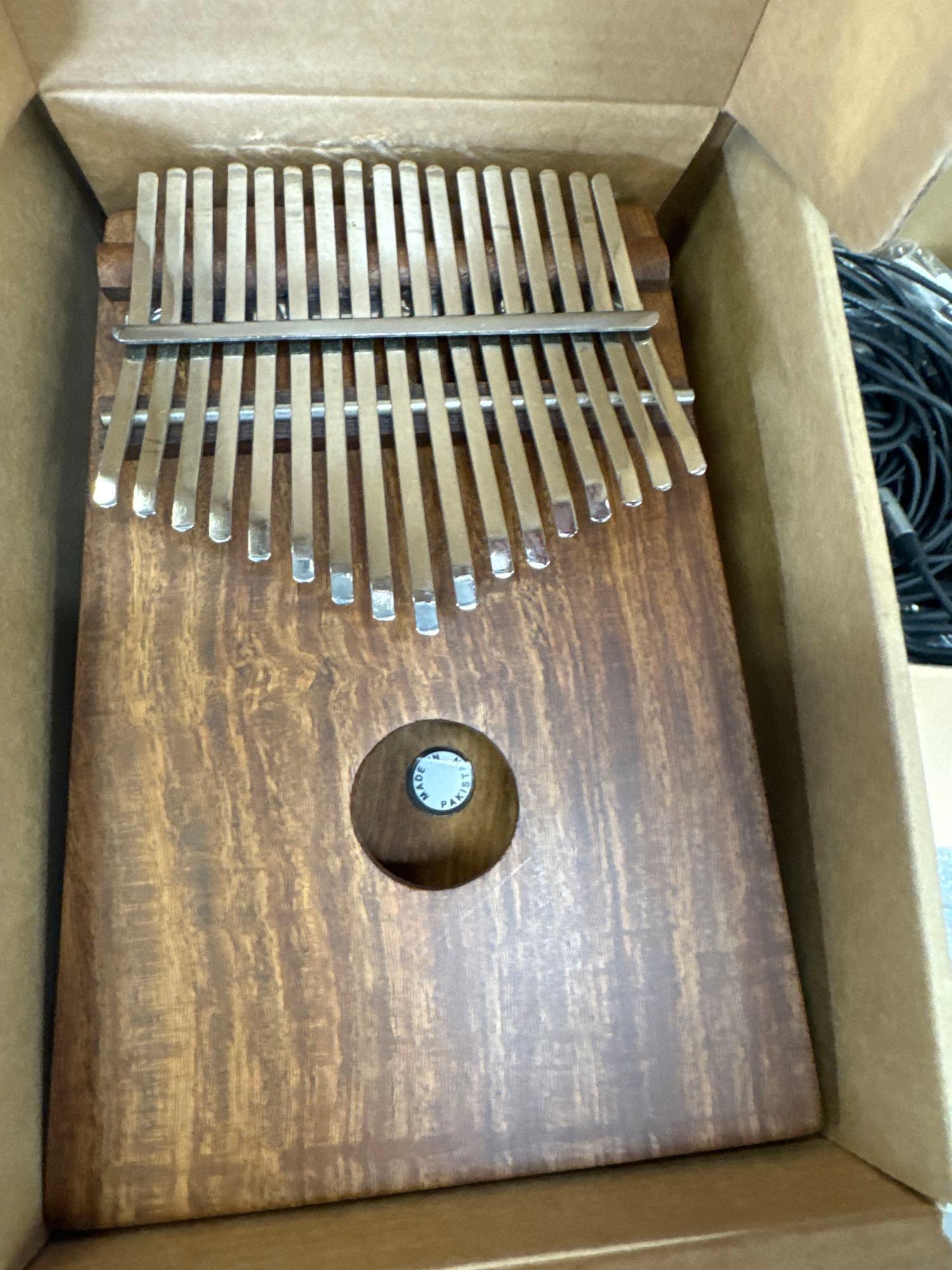 Bench, cables, Kalimba and accessories