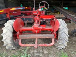 Farmall BN Tractor w/spring tooth harrow attachment