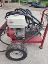 Honda 11.0 hp pressure washer with heavy rubber hose, psi unknown
