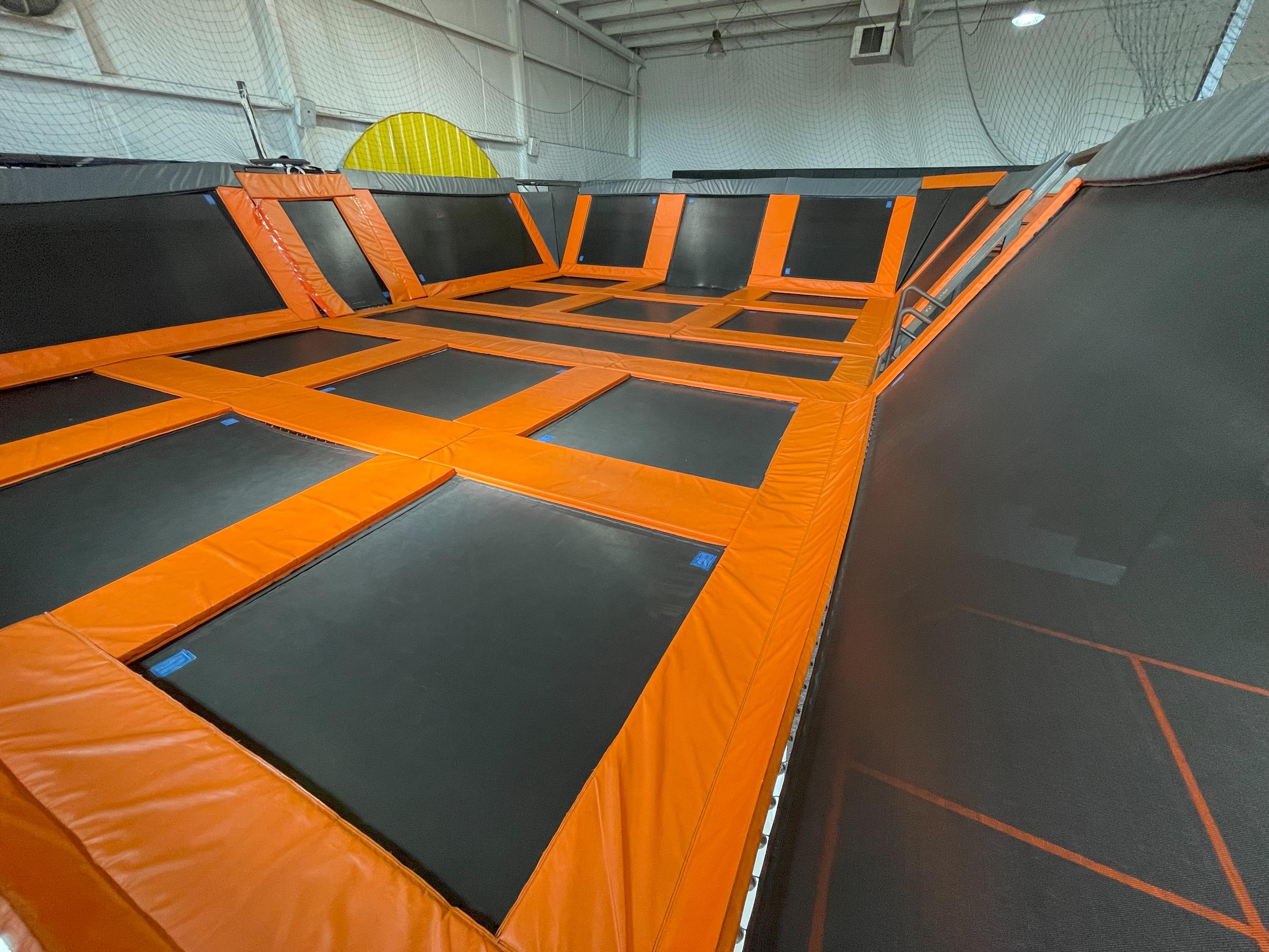 small trampoline system or dodgeball court with netting