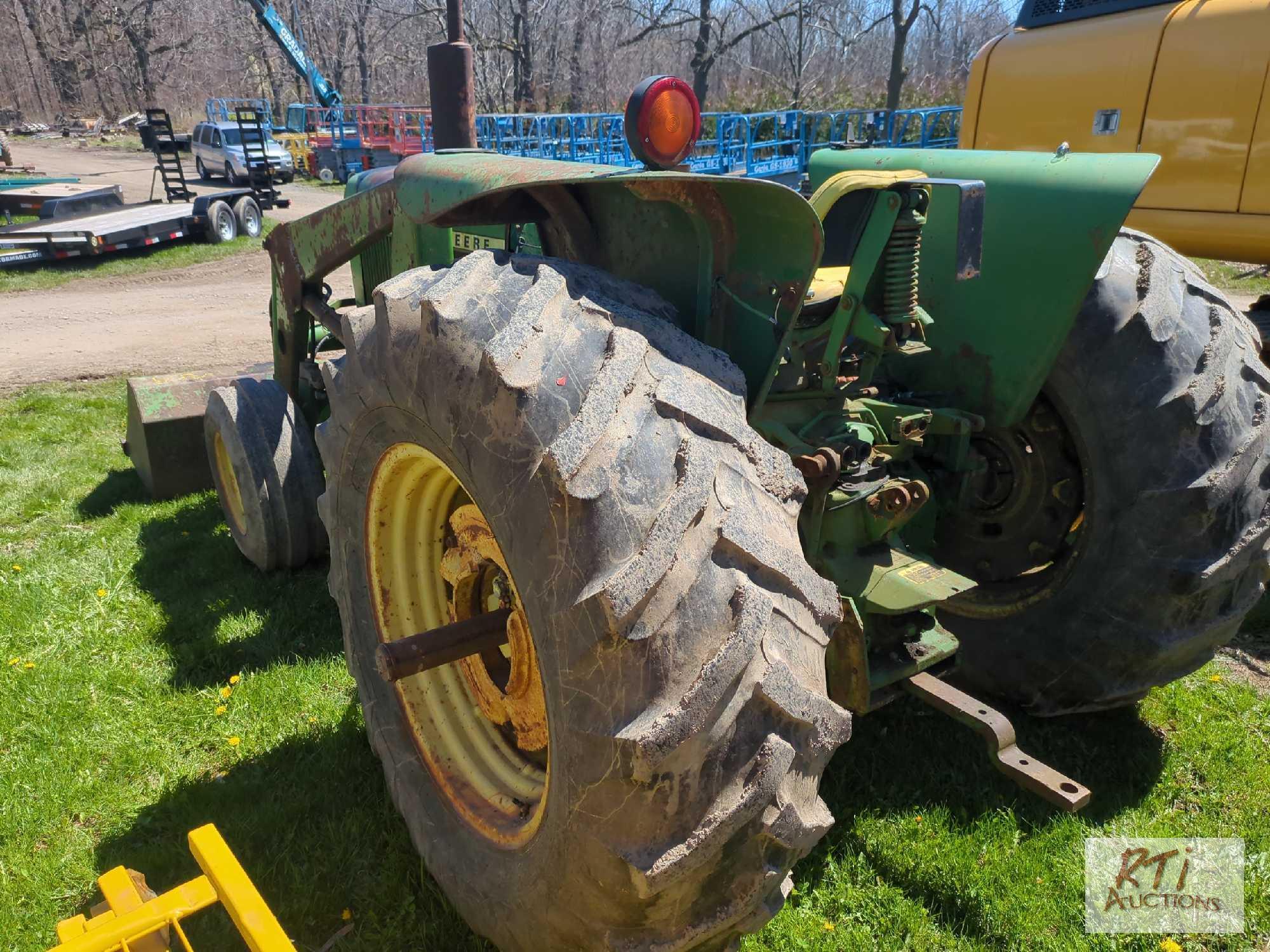 John Deere 2640 tractor with loader, rides and drives, runs okay, no 3 pt hitch